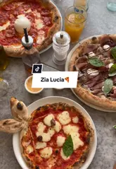 A promotional video for Zia Lucia pizza restaurant, highlighting their summer stamp card loyalty offer for families and showcasing their pizzas and desserts.