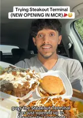 A creator reviews food from a new takeaway spot called Steakout Terminal in Manchester, eating the meal in his car.