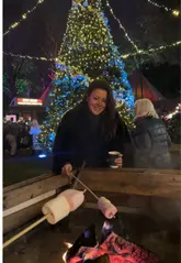 A festive vlog showcasing the Chelsea Winter Village, featuring an illuminated light trail, interactive installations, food stalls, a bar, and activities like curling.