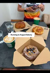 A creator documents a 'bakery run' in London, starting with a morning jog and ending with a visit to August Bakery to try their pastries.