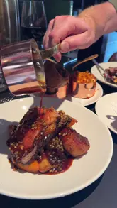 A review of the Sunday roast at Lennox in Edinburgh, highlighting the creative sides like oxtail ragù-stuffed Yorkshire puddings and the overall quality of the meal.