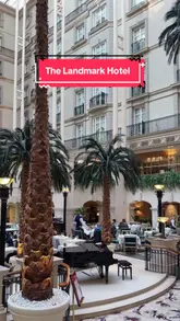 A visually stunning tour of the atrium at The Landmark Hotel in Marylebone, showcasing the unique 'dining under the palms' afternoon tea experience.