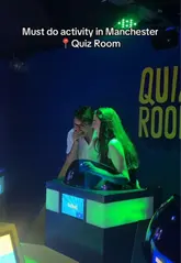 A high-energy, vlog-style reel showcasing the 'Quiz Room' experience in Manchester, featuring gameplay, competitive elements, and the venue's bar area.