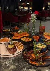 A promotional video for Decorum in Birmingham, showcasing the restaurant's interior design and a selection of their menu items including steaks, seafood, and starters.