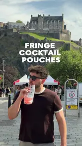 A creator reviews the resealable cocktail pouches available at Kimpton Charlotte Square in Edinburgh, demonstrating their convenience for enjoying drinks while attending the Fringe festival.