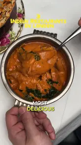 A creator reviews three Indian restaurants in London, showcasing various dishes like lobster biryani, butter chicken, and chaat, while providing personal recommendations.