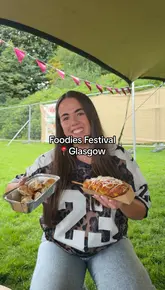 A vlog-style video showcasing a visit to the Foodies Festival in Glasgow, highlighting various food stalls, drinks, and activities like the Indomie noodle game.