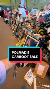 A vlog-style video featuring a woman and a child exploring the Polmadie Carboot sale in Glasgow, highlighting the experience of finding bargains and vintage items.
