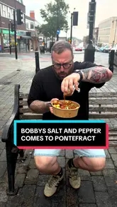A creator visits the newly opened Bobby's Salt and Pepper in Pontefract, showcasing the queue, the kitchen preparation of their signature salt-and-pepper dishes, and providing a taste test.