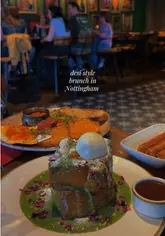 A short, aesthetic reel showcasing a desi-style brunch at Passan's in Nottingham, featuring close-ups of a full breakfast platter and pistachio-stuffed French toast.
