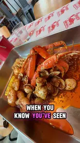 A creator visits Angry Crab Shack in Borough Market to try a seafood boil for the first time, documenting the messy, hands-on dining experience.