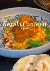 A promotional video for Kerala Canteen in Leeds, featuring a variety of Indian tapas dishes including a unique beef curry pie, roasted chilli garlic chicken, and lamb chops. The video highlights the fusion of authentic Kerala recipes with Yorkshire produce.