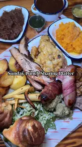 A high-energy food review of a Sunday Roast Sharing Platter at BRGR in Bridgend, featuring a variety of meats, sides, and desserts.