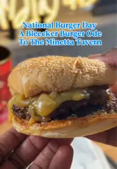 A creator reviews a special collaboration burger from Bleecker Burger, highlighting the 'Minetta Tavern' style burger. The video features the creator unboxing the burger, discussing the quality, and performing a taste test.