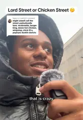 The video features a creator walking down Lord Street in Liverpool, pointing out the high concentration of major fast-food chicken chains, including Chick-fil-A, Wingstop, KFC, Dave's Hot Chicken, and Popeyes, all located in close proximity.