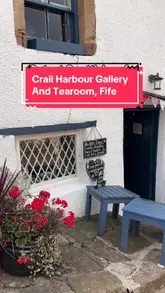 A short, aesthetic video showcasing the Crail Harbour Gallery and Tearoom in Scotland, highlighting its scenic seaside location, outdoor garden seating, and interior atmosphere.
